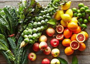 a group of fruits and vegetables on a wood surface Healthy Weight Loss Diets Amersham