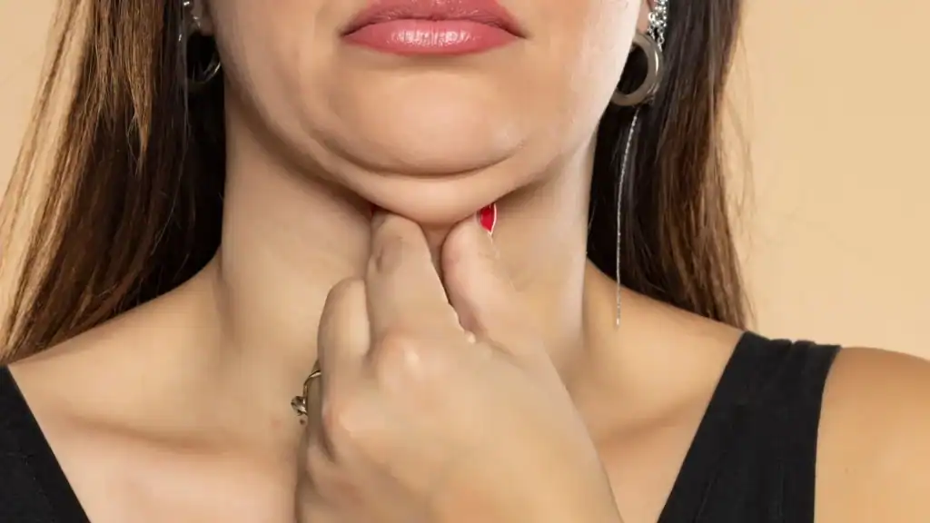 An image of a woman with double chin, sad, worried : Non Surgical Double Chin Removal Treatment in Amersham, UK